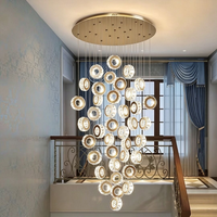 Lustre personnalisé Shanda en acier inoxydable avec cristaux K9, éclairage LED à 3 couleurs, intensité réglable, hauteur ajustable, CRI 95, garantie 2 ans