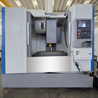 Centre d'usinage vertical CNC VMC1160 pour la fabrication de moules de pièces automobiles, moteur de broche 11 kW avec table de travail à rainures en T