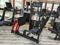 Appareil de musculation réglable à charge par pignon, presse à jambes horizontale assise à levier, pour entraînement de force
