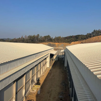 Bâtiment d'élevage avicole multi-étages en structure acier préfabriquée pour poulailler et élevage de poules pondeuses, avec garantie de 5 ans