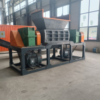 Déchiqueteuse de pneus à double arbre, entièrement automatique, haute efficacité, respectueuse de l'environnement, pour pneus entiers, fabriquée en Chine