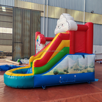 Château gonflable en PVC avec toboggan arc-en-ciel, location commerciale, fabrication OEM