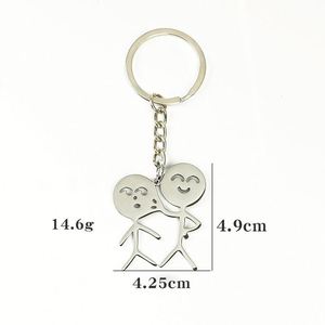 Divertido y parodista colgante para bolso de personaje de dibujos animados, llavero de acero inoxidable al por mayor con diseño de pareja de caras que se pellizcan y mecha de cerillas - Product Image 4