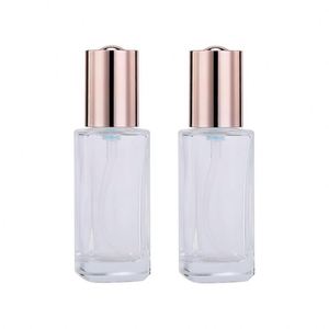 Botella de Perfume de Vidrio Grueso Transparente de 50 ml, con Fondo Plano, Tapa Plateada Mate, Pulverizador con Bomba, Impresión de Pantalla y Logotipo Personalizado, OEM de Lujo - Product Image 1