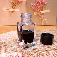 Vente en gros d'encre en verre Encrier Stylo plume Eau Papeterie Distributeur Bouteille vide