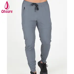 热销定制商标锥形合身拉链口袋隐藏式侧袋男士健身运动热身裤运动裤
