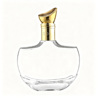 Bouteille en verre de luxe unique en forme d'aile, transparente, en verre flint de haute qualité, pour spiritueux, liqueurs, vodka, whisky, gin, 750 ml, avec bouchon verseur à vis doré