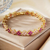 Bracelet de luxe en gros, trèfle à quatre feuilles coloré en CZ, en cuivre plaqué or 18 carats, avec zircon arc-en-ciel, bijou pour femme
