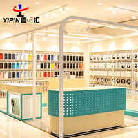 Meuble de magasin mobile multi-niveaux personnalisé, vitrine murale pour présentation de téléphones et d'électronique, stand pour magasin de téléphonie mobile