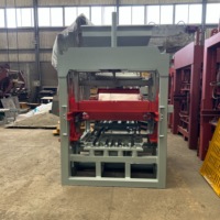 Machine automatique de fabrication de briques de pavage QT4-15 avec contrôle hydraulique PLC pour usine de matériaux de construction