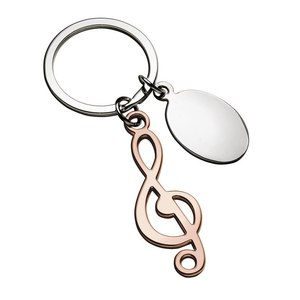 Llavero con Clave de Sol en Oro Rosa, Accesorio Metálico con Nota Musical - Product Image 1