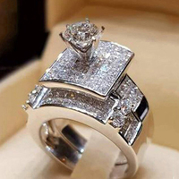CAOSHI Magnifiques bagues de mariage en forme géométrique, ensemble de 2 pièces, bagues de fiançailles, bijoux en laiton tendance, couleur argentée plaquée, bagues en zircon