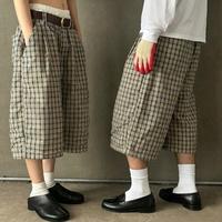 Pantalon court unisexe personnalisé en nylon et polyester avec bande latérale, coupe ample et oversize, idéal pour l'été, style jogger ou short de sport pour homme