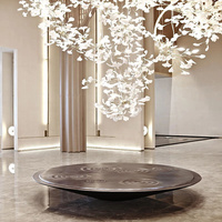 Lustre personnalisé pour la décoration du hall d'hôtel, lustre moderne en céramique long avec feuilles de ginkgo