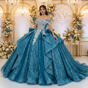 ชุดราตรีงาน Quinceanera รุ่น Xs312 ดีไซน์สวยหรู สายเดี่ยวประดับคริสตัล คอร์เซ็ทผูกโบว์ที่เอว แต่งเลื่อมสีเขียวอมฟ้า ผ้าลูกไม้ ทรงบอลกาวน์ ยี่ห้อ Jancember - Product Image 1
