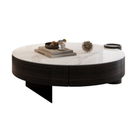 Table basse ronde moderne avec plateau en pierre frittée blanche et base de rangement en bois foncé