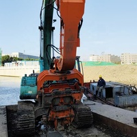 Marteau vibrant hydraulique monté sur excavatrice KN200 pour le battage de pieux tubulaires et de pieux-plaques