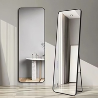 Miroir de sol minimaliste fait à la main, cadre en métal noir, motif d'arc rectangulaire, verre de mariage décoratif debout