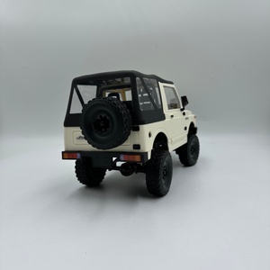 SJY-C-74-1 C74 Voiture de course RC Jimny 4x4 à l'échelle 1/10, 2,4 GHz, 4 canaux, en métal, avec télécommande et câble USB, pour intérieur/extérieur - Product Image 5