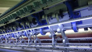 A quilting machine with multiple stitches for quilting the edge fabric of the quilted mattress - Product Image 4