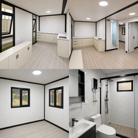 Maison pliable extensible gris foncé avec véranda, idéale pour le glamping en extérieur, le bureau ou l'hébergement temporaire