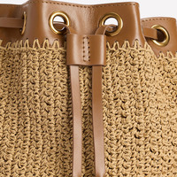 Sac seau en paille naturelle tressée avec cordon de serrage, œillets métalliques décoratifs, sangle en similicuir, sac bandoulière décontracté pour femme, idéal pour les voyages