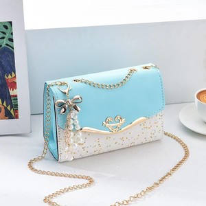 SH0057 <span class=keywords><strong>Sacs</strong></span> <span class=keywords><strong>à</strong></span> <span class=keywords><strong>main</strong></span> et pochettes <span class=keywords><strong>tendance</strong></span> pour femmes, design élégant avec pendentif perle, portables, imperméables, vente chaude par le créateur - Product Image 1