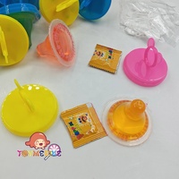 Vente en gros en vrac sac bouteille emballage Halal gelée pouding bonbons avec des bonbons à éclater saveur fruitée doux mamelon gelée
