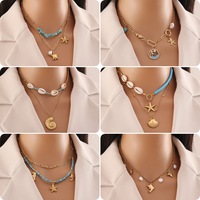 Nouveau Collier Tendance Style Océanique avec Perles Colorées, Pierres, Pendentifs Dauphin, Coquillage, Étoile de Mer, Conque – Bijoux Fantaisie Plaqué Or