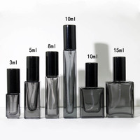 Flacon en verre de parfum noir translucide à logo personnalisé 3ml 10ml 15ml recharge de parfum Rollerball flacon vaporisateur de parfum haut de gamme