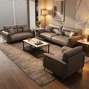 Divano in Pelle Grigia per Area Relax Ufficio con Illuminazione Ambientale Calda e Seduta Confortevole per Spazi Lounge Aziendali - Product Image 5