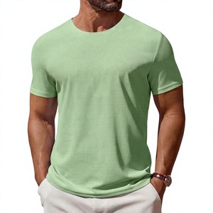 เสื้อยืดแขนยาวสีเขียวล้วนสำหรับผู้ชาย ทรงโอเวอร์ไซส์ คอกลม สวมใส่สบาย ระบายอากาศได้ดี ผลิตจากผ้าฝ้าย 100% เป็นมิตรต่อสิ่งแวดล้อม - Product Image 1