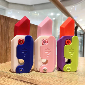 1 ud. Cuchillo de juguete de gravedad con impresión 3D, Cuchillo de juguete pequeño con diseño de rábano para saltar, Juguetes antiestrés, Tarjeta de empuje de descompresión, Cuchillo de juguete pequeño con diseño de zanahoria - Product Image 2