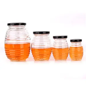 Hot Sell 100g 250g 250g 500g 750g Empty Round Thread Bee Shaped Glass Honey Jam Jar For Storage Bottle Jar With Metal Tin Lid