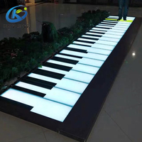 Pratique de fête de mariage géant, plancher de danse interactif illuminé en forme de Piano géant, à utiliser pour l'extérieur ou commerciale