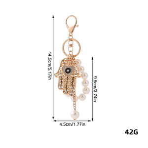 Factory Wholesale Evil Eye Hamsa Hand <strong>Keychain</strong> Pearl Beaded Key Ring Metal Hollow Pendant Fashion Bag Charm for Women Gift - Product Image 6