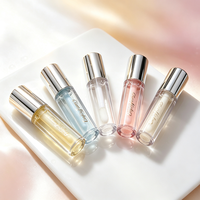 Huile à lèvres EnjoyFancy en tube transparent avec capuchon argenté, enrichie en vitamines C et E, hydratante et repulpante, gloss à lèvres multi-tons, format voyage.