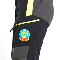 Vente en gros Pantalon Cargo haute visibilité pour hommes Pantalons de travail Cargo réfléchissants Uniforme de travail pour hommes