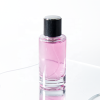 Bouteille de parfum de luxe à fond épais claire forme Unique 30ml 50ml 100ml bouteille de parfum en verre pour l'air de pulvérisation de presse portable pour hommes