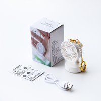 Ventilateur de table portable pour enfants, mini pendentif tendance 2026, mignon, pour l'extérieur, avec logo personnalisé, rechargeable par USB, moteur DC, commande par bouton