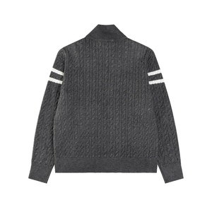 Veste d'hiver hybride noire Moncler à col montant avec manches en tricot torsadé et doubles rayures blanches - Product Image 2
