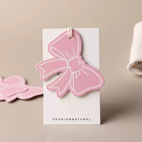 Étiquettes suspendues en carton personnalisées en forme de nœud rose avec code-barres pour chaussettes, chaussures, vêtements et étiquettes de vêtements – Vente en gros