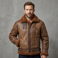 Blouson aviateur classique vintage pour homme en cuir véritable, peau de mouton, fourrure réversible, logo sur le devant, design tendance pour l'hiver