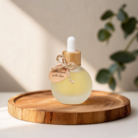 Flacon compte-gouttes avec bec verseur de précision et verre givré, idéal pour le rangement dans la cuisine et l'utilisation d'ingrédients cosmétiques
