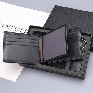Set regalo da <span class=keywords><strong>uomo</strong></span> di vendita caldo <span class=keywords><strong>portafoglio</strong></span> tascabile in vera pelle confezionato squisito <span class=keywords><strong>e</strong></span> Set regalo <span class=keywords><strong>portachiavi</strong></span> per la festa del papà