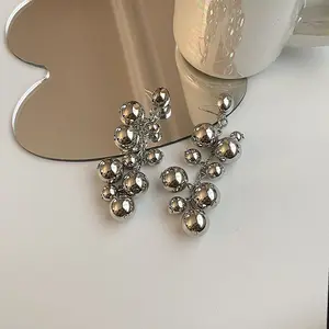 New personality long fringe round beaded earrings Metallic vintage style studs Premium drop earrings