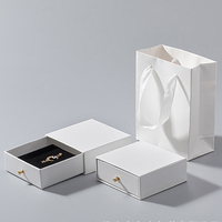 Vente en gros Boîte d'emballage avec logo personnalisé pour bijoux Boîte de papier à tiroir coulissant avec mousse noire pour emballage de bijoux
