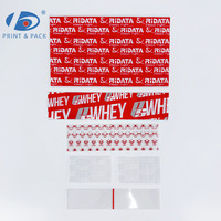 Film rétractable en PVC rouge personnalisé avec logo pour bouchon de bouteille, bande thermorétractable en plastique