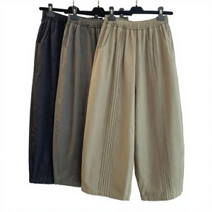 Pantalon plissé noir à jambes larges pour femme, taille élastique, coupe ample décontractée, bas de tenue oversize pour l'été - Product Image 4