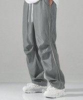 Pantalon de jogging large pour femme en Spandex et Polyester, taille élastique, bande latérale, coupe ample, longueur intégrale, décontracté, ODM OEM